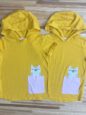 Matching yellow t-shirts with hoods