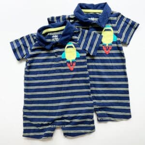Matching rompers for twin boys