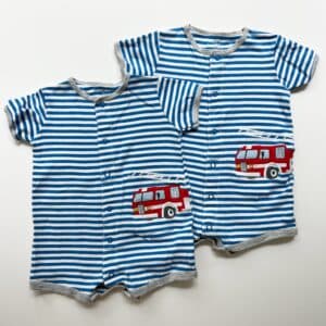 Matching rompers for twin boys